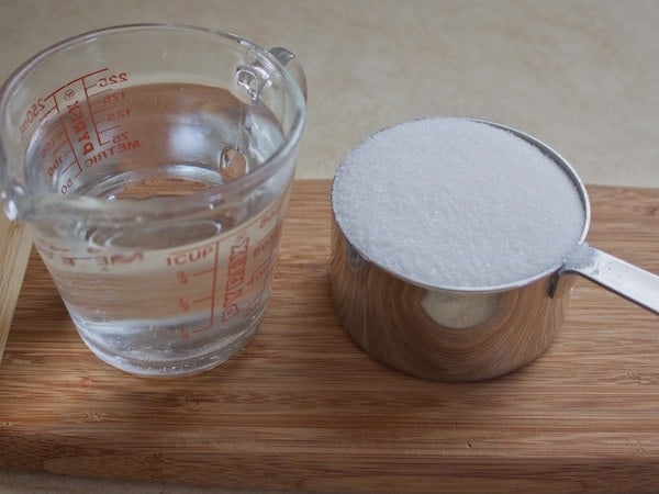 One cup of water. One cup of granulated sugar.