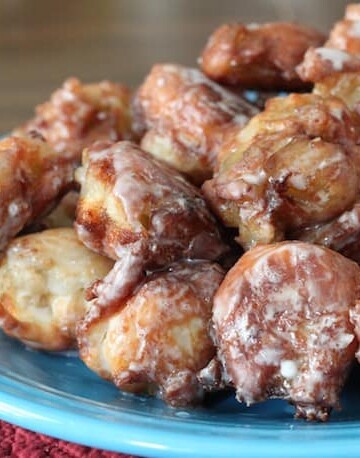 Gluten-Free Apple Fritters on a blue plate.