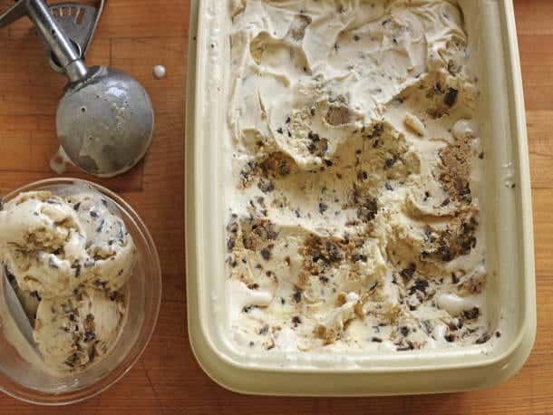 Gluten-free chocolate chip cookie dough ice cream in container.