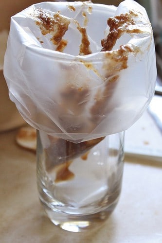 Gluten-Free Cinnamon Bun Waffle topping in pastry bag.