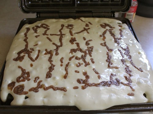 Gluten-Free Cinnamon Bun Waffle batter in pan.