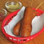 Gluten-Free Corn Dogs in a red basket.