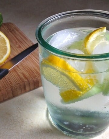 Glass of lemon cucumber water.