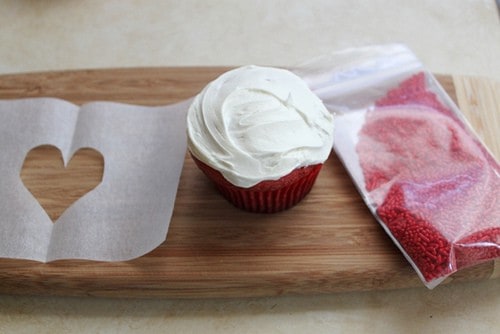 Heart paper template. Frosted cupcake. Bag of sprinkles.