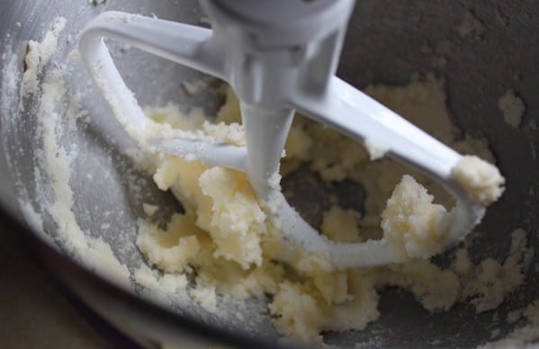 Creaming butter for easy gluten-free Christmas cookies.