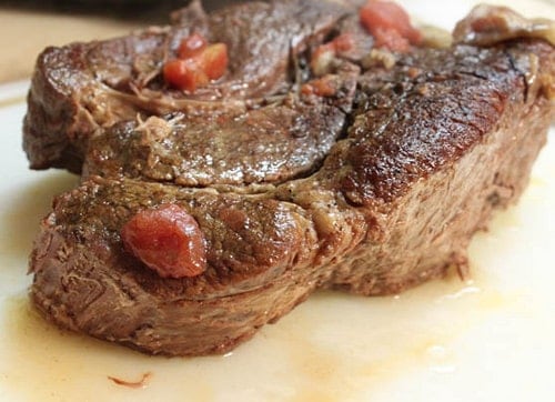 Cooked paleo pot roast on cutting board.