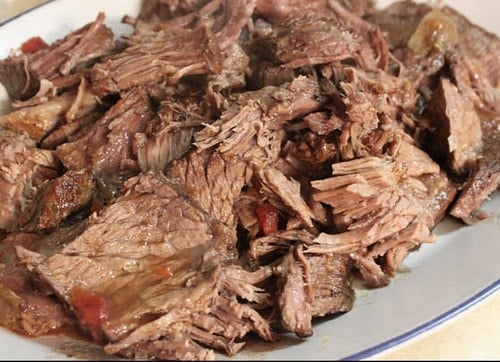 Shredded paleo pot roast on platter.