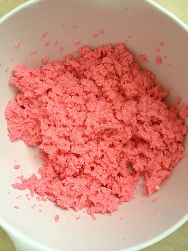 Butter dyed pink for gluten-free sugar cookie dough.