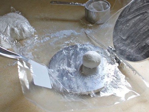 Gluten-Free Flour Tortilla dough ball on a press.