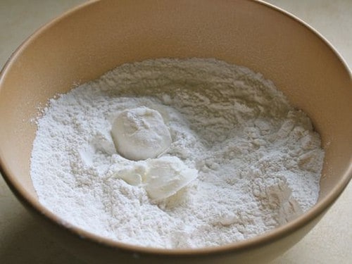 Gluten-Free flour tortilla dry ingredients and shortening in bowl.