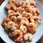 Cooked garlic shrimp on platter.