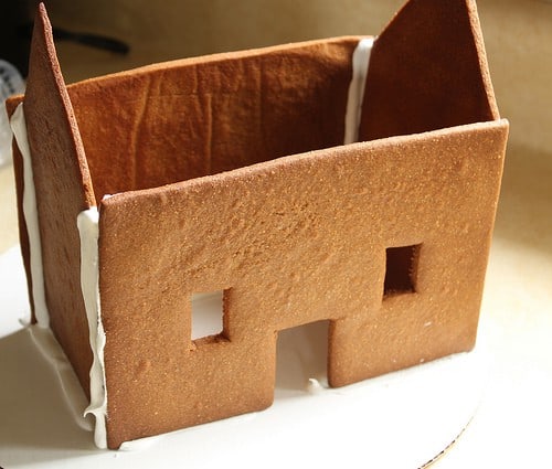 Gluten-free gingerbread house with no roof.