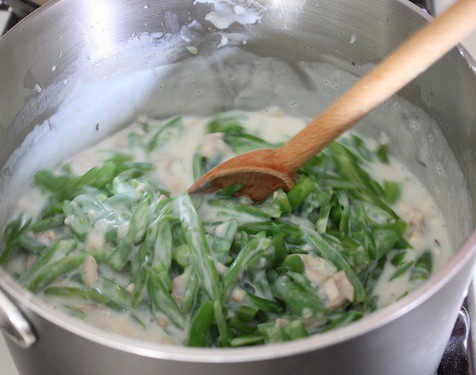 Green bean casserole filling in pot.