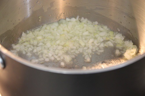Cooking onion in a pan.