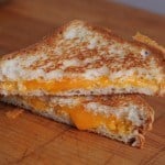 Gluten-free grilled cheese on a cutting board.