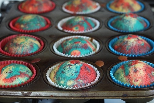 Red, White, and Blue cupcakes baked in a muffin tin.