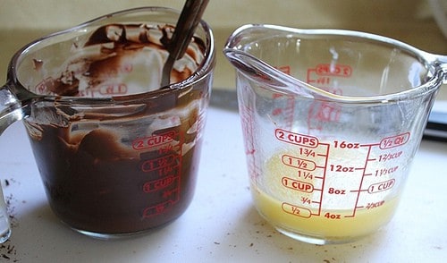 Melted chocolate in measuring cup.(left). Melted butter in measuring cup. (right)