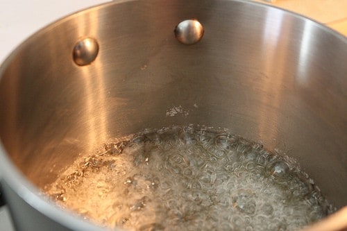 Boiling sugar syrup on the stove.