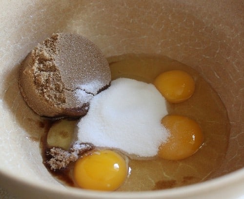 Eggs, brown sugar, and granulated sugar for gluten-free brownies.