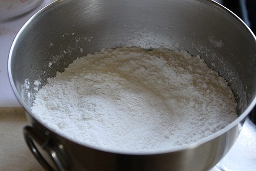 Flour in bowl for gluten-free brownies.