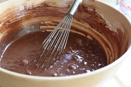 Gluten-free brownie batter in brown bowl.