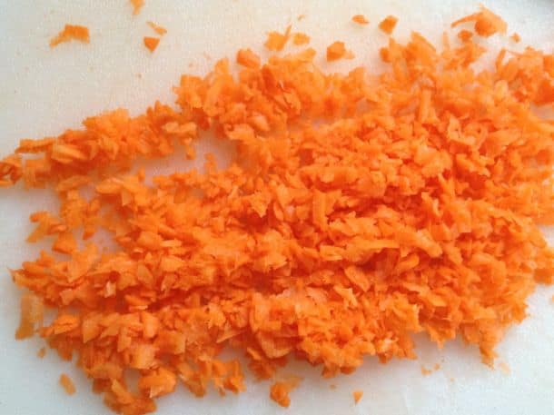 Chopped carrots for gluten-free spinach dip.