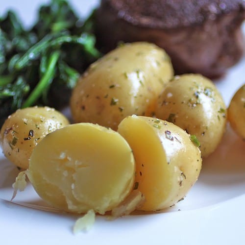 Steamed Potatoes with butter and herbs.