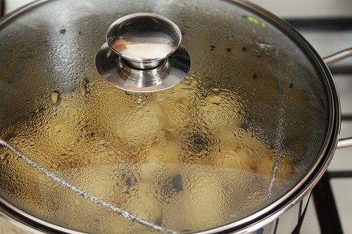 Steamed Potatoes in pot.