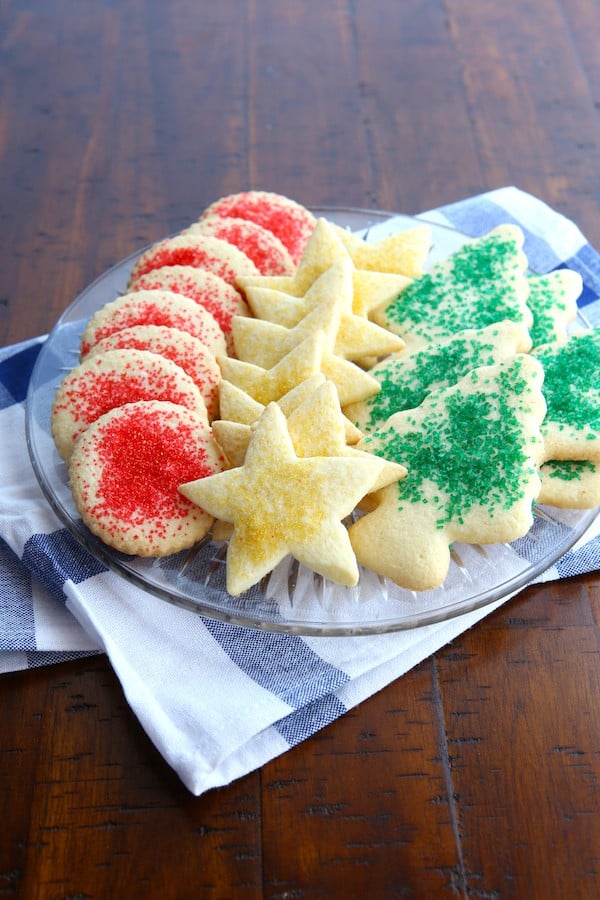 Gluten-Free Sugar Cookies topped with colored sugar on a plate.