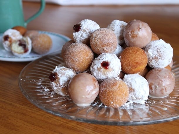 Gluten-free doughnut holes on plate.