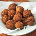 Gluten-Free Hush Puppies on a paper towel-lined bowl.