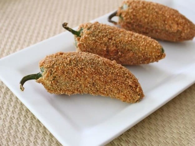 Gluten-Free Jalapeno Poppers on a white platter.