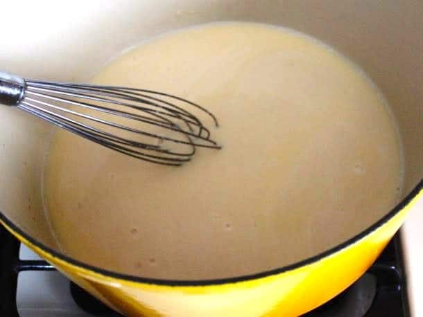 Cooked cheese sauce for gluten-free macaroni and cheese.
