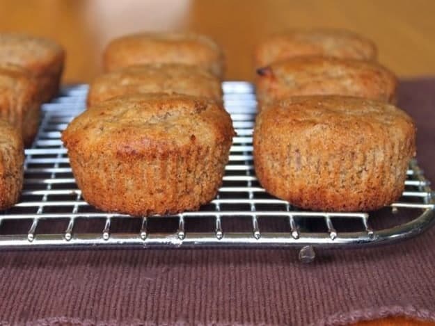 Gluten-free oatmeal vegan muffins on a wire rack.