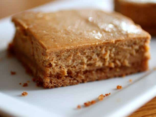 Sweet Potato Cheesecake Bars on a white platter.