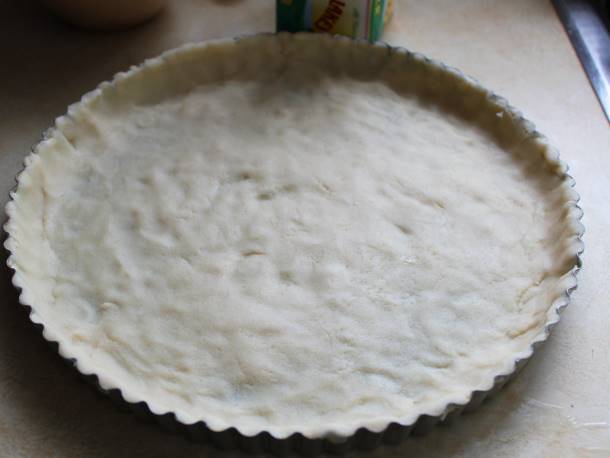 Gluten-free tart dough in pan.