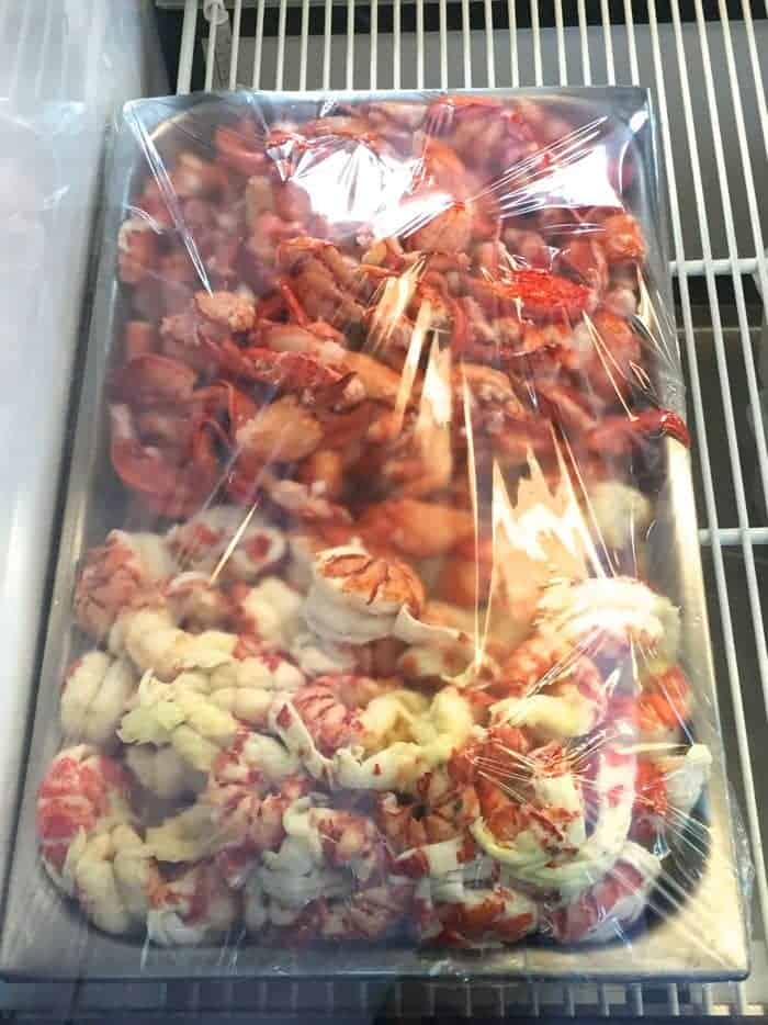Lobster meat in deli display tray.