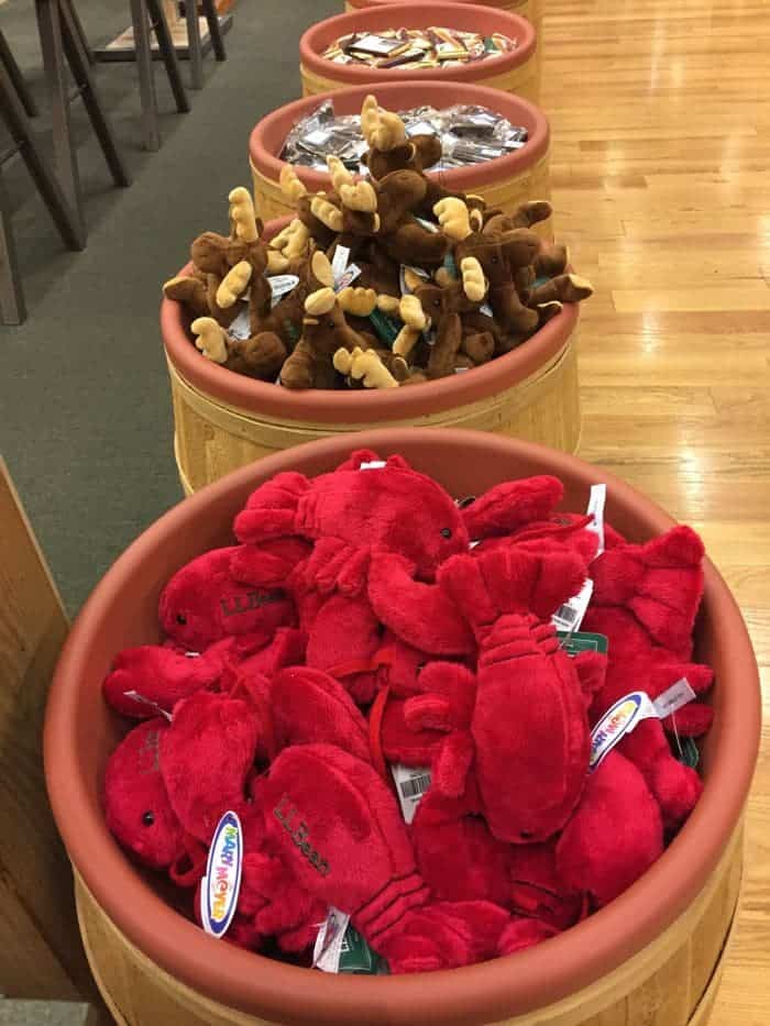 Barrel of stuffed toy lobsters. Barrel of stuffed toy moose.