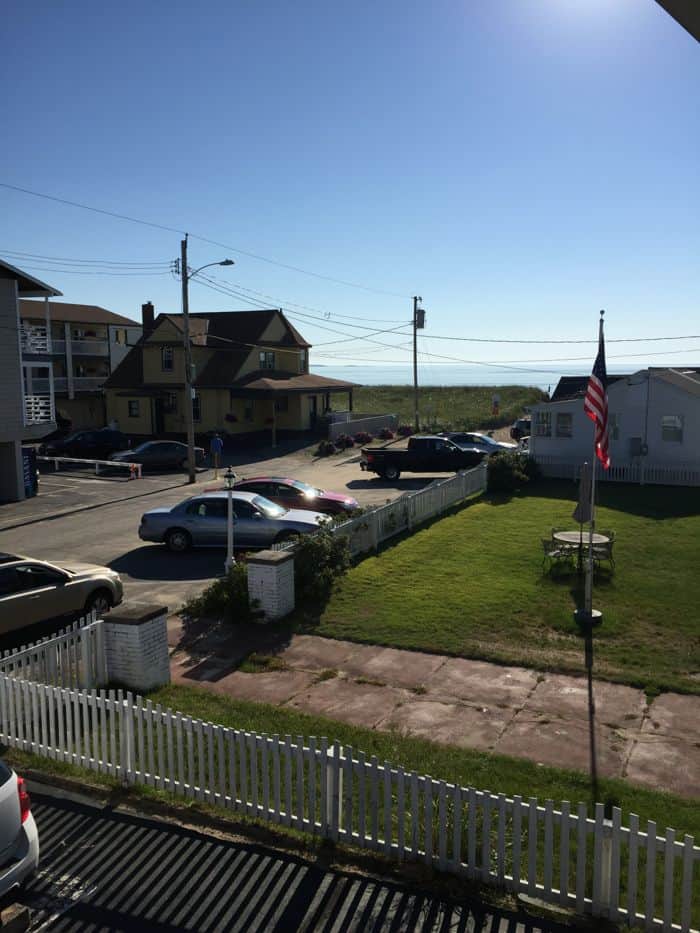 Hotel parking lot. Ocean in the distance.