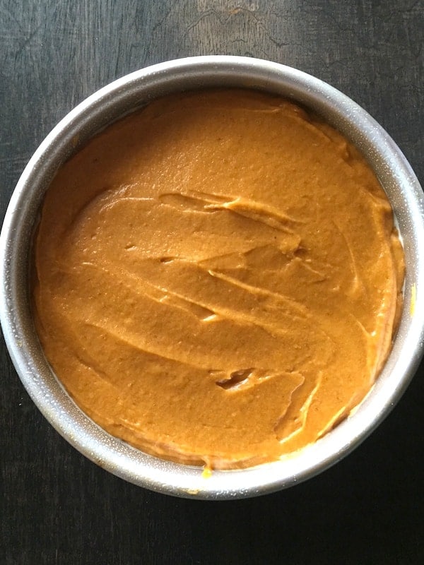 Easy Gluten-Free Pumpkin Cake batter in a round cake pan.
