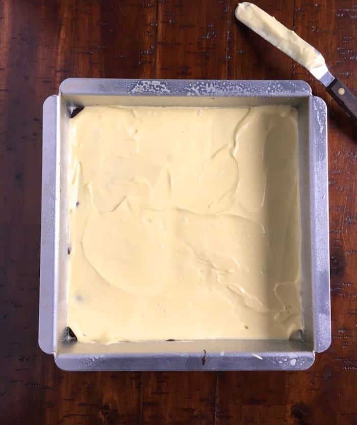 Gluten-free cheesecake batter in pan.