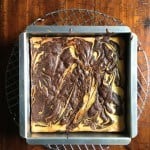 Gluten-free cheesecake brownies in pan.