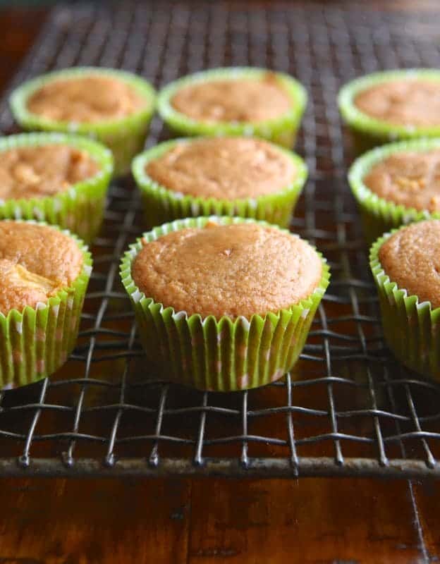 Paleo apple muffins on a cooling rack.