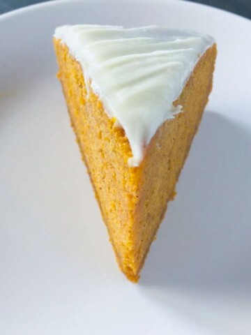 Pumpkin Spice Cake Slice on a white plate.