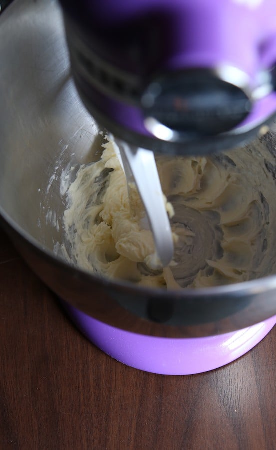 Butter being mixed in a kitchen aid mixer.