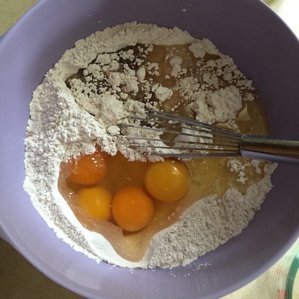 Gluten-free zucchini bread batter being mixed.