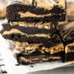 Stack of gluten-free peanut butter brownies.
