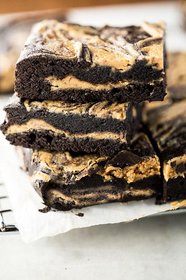 Stack of gluten-free peanut butter brownies. 