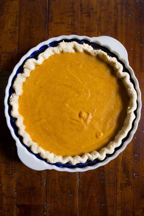 Egg-free, dairy-free, gluten-free pumpkin pie in pan.