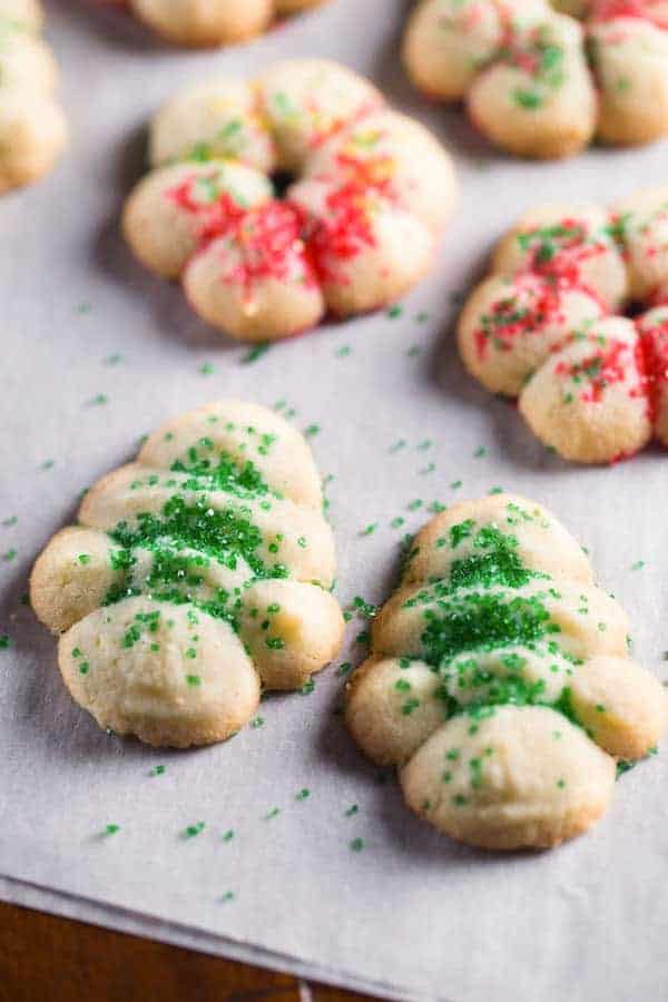 Gluten-free spritz cookies on baking sheet.